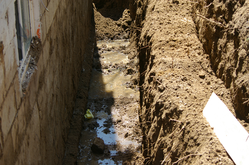 Excavation for basement waterproofing repair